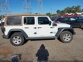 2019 Jeep Wrangler Unlimited — photo 13 of 16 | VIN 1C4HJXDG6KW677506