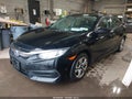 2018 Honda Civic — photo 2 of 15 | VIN 19XFC2F55JE200686