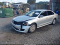 2015 Volkswagen Passat — photo 2 of 16 | VIN 1VWAT7A39FC052325