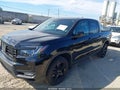 2021 Honda Ridgeline — photo 2 of 16 | VIN 5FPYK3F81MB010529