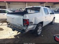 2014 Honda Ridgeline — photo 4 of 17 | VIN 5FPYK1F59EB012072
