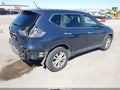 2015 Nissan Rogue — photo 4 of 12 | VIN 5N1AT2MTXFC875519