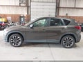 2016 Mazda CX-5 — photo 14 of 16 | VIN JM3KE4DY0G0890583