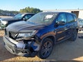 2021 Honda Passport — photo 2 of 16 | VIN 5FNYF8H55MB019859