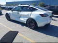 2023 Tesla Model Y — photo 3 of 15 | VIN 7SAYGDEF1PF741453