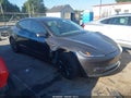 2025 Tesla Model 3 — photo 12 of 18 | VIN 5YJ3E1EA4SF904640