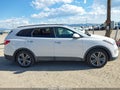 2016 Hyundai Santa Fe — photo 14 of 18 | VIN KM8SRDHF1GU145688