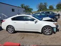 2013 Acura TL — photo 14 of 17 | VIN 19UUA8F55DA016163