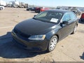 2014 Volkswagen Jetta — photo 2 of 11 | VIN 3VWD17AJ0EM234655