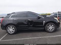 2011 Cadillac SRX — photo 13 of 16 | VIN 3GYFNGEY1BS610837