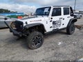 2016 Jeep Wrangler Unlimited — photo 2 of 18 | VIN 1C4BJWDG0GL159416