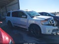 2013 Nissan Armada — photo 13 of 18 | VIN 5N1AA0NE0DN612922