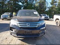 2016 Honda Pilot — photo 13 of 19 | VIN 5FNYF6H51GB037607