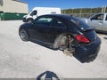2015 Volkswagen Beetle — photo 3 of 12 | VIN 3VWF17AT1FM651780