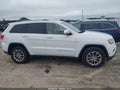 2015 Jeep Grand Cherokee — photo 13 of 16 | VIN 1C4RJEBGXFC744384