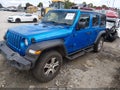 2022 Jeep Wrangler Unlimited — photo 2 of 12 | VIN 1C4HJXKN1NW192440