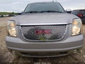 2007 GMC Yukon — photo 6 of 11 | VIN 1GKFC130X7R382065