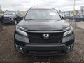 2019 Honda Passport — photo 12 of 16 | VIN 5FNYF7H92KB005444