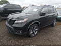 2019 Honda Passport — photo 2 of 16 | VIN 5FNYF7H92KB005444