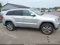2011 Jeep Grand Cherokee — photo 13 of 16 | VIN 1J4RR4GG7BC646039