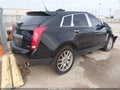 2013 Cadillac SRX — photo 4 of 11 | VIN 3GYFNCE35DS534362