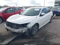 2018 Honda Civic — photo 2 of 16 | VIN 19XFC2F74JE020245