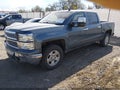 2014 Chevrolet Silverado 1500 — photo 2 of 16 | VIN 3GCUKREC2EG398074