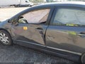 2010 Honda Civic — photo 13 of 14 | VIN 2HGFA1F57AH571029