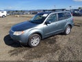 2012 Subaru Forester — photo 2 of 11 | VIN JF2SHADC1CH460089