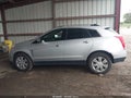 2013 Cadillac SRX — photo 14 of 16 | VIN 3GYFNCE3XDS654738