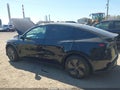 2026 Tesla Model Y — photo 14 of 18 | VIN 7SAYGDEE3TF377330