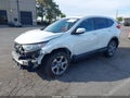 2017 Honda CR-V — photo 2 of 17 | VIN 2HKRW2H8XHH666499
