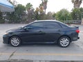 2013 Toyota Corolla — photo 15 of 17 | VIN 2T1BU4EE7DC097797