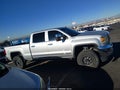 2015 GMC Sierra — photo 13 of 19 | VIN 1GT12ZE8XFF664586