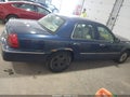 2006 Mercury Grand Marquis — photo 13 of 16 | VIN 2MEFM75V36X651675
