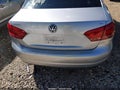 2014 Volkswagen Passat — photo 14 of 17 | VIN 1VWBH7A30EC015880