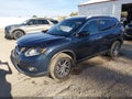 2016 Nissan Rogue — photo 2 of 16 | VIN 5N1AT2MVXGC844578