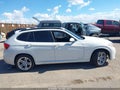 2014 BMW X1 — photo 14 of 17 | VIN WBAVL1C55EVY17496