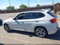 2014 BMW X1 — photo 15 of 17 | VIN WBAVL1C55EVY17496