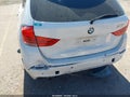 2014 BMW X1 — photo 6 of 17 | VIN WBAVL1C55EVY17496