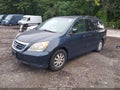 2010 Honda Odyssey — photo 2 of 10 | VIN 5FNRL3H62AB098900