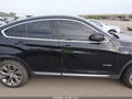 2016 BMW X4 — photo 14 of 17 | VIN 5UXXW3C57G0R22599