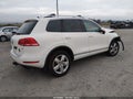 2012 Volkswagen Touareg — photo 4 of 12 | VIN WVGFF9BP1CD003084