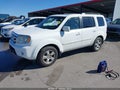 2011 Honda Pilot — photo 2 of 13 | VIN 5FNYF4H67BB067412