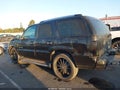 2003 Cadillac Escalade — photo 14 of 18 | VIN 1GYEK63N13R143379