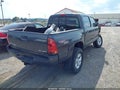 2011 Toyota Tacoma — photo 4 of 18 | VIN 3TMLU4EN4BM063356