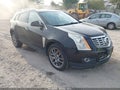 2016 Cadillac SRX — photo 1 of 11 | VIN 3GYFNCE34GS515032