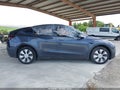 2023 Tesla Model Y — photo 12 of 15 | VIN 7SAYGDEE6PA176248