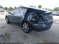 2023 Tesla Model Y — photo 3 of 15 | VIN 7SAYGDEE6PA176248