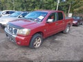 2004 Nissan Titan — photo 2 of 11 | VIN 1N6AA07A34N501227